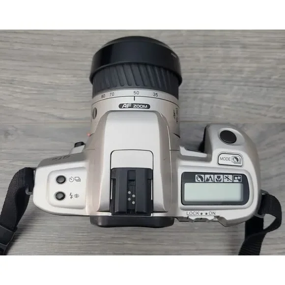 Minolta 35mm Camera Dynax 303si Maxxum QTsi Kit with Travel Bag and Accessories
